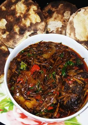 A picture of Roasted New Yam and Ukana with 4 lives Sauce.😂😁😀.