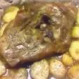 Paletilla de cordero asada con patatas