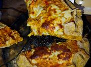 Una foto de bifes de pollo