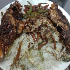 A picture of Grilled fish vegetable rice.