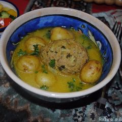 A picture of Kufteh bozbash (stuffed meatball).