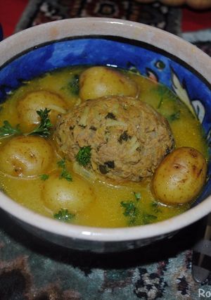A picture of Kufteh bozbash (stuffed meatball).