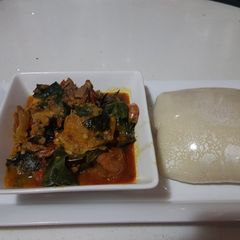 A picture of Semolina with Oha Soup.