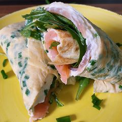 A picture of Omelet wrap with salmon and arugula 💛.