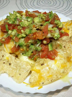 Una foto de Nachos con queso extrabuenos