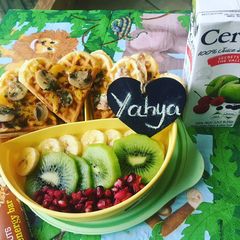 A picture of Heart shaped savory waffles.