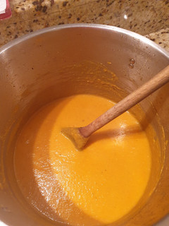 A picture of Spiced carrot and lentil soup.