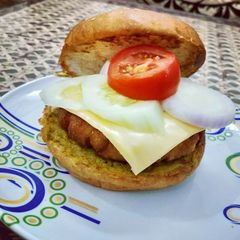 Cheesy double Aloo Tikki Burger A picture of Cheesy double Aloo Tikki Burger.