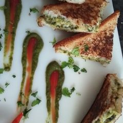 A picture of Cheesy Spinach Sabzi Tava Sandwiches.