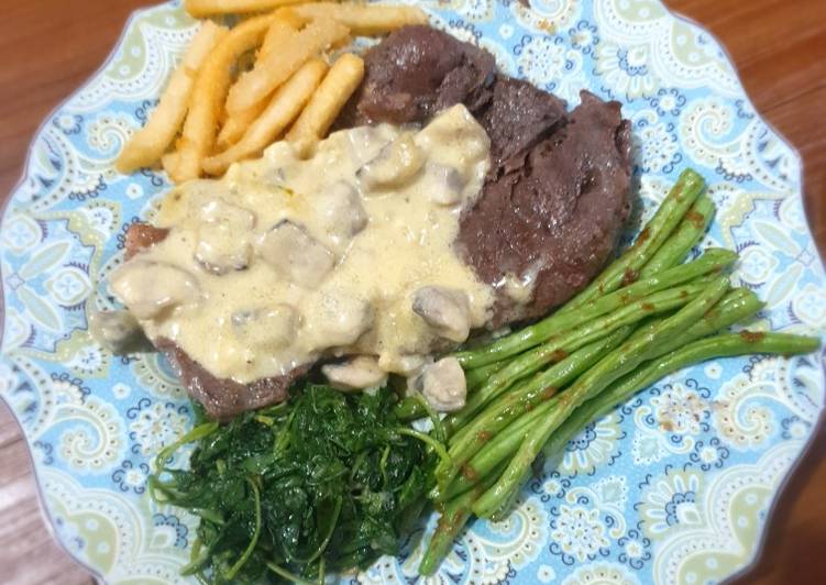 Steak with mushroom sauce