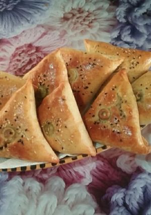 Une photo de Triangles Gourmands aux Épinards, Olives et Fromage