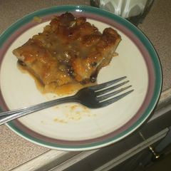 A picture of Bread pudding with pecan whiskey sauce.