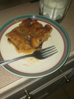 A picture of Bread pudding with pecan whiskey sauce.