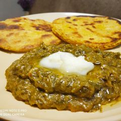 Sarso Saag with Makki Roti A picture of Sarso Saag with Makki Roti.
