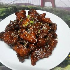 A picture of Chicken Popcorn with Sweet and Spicy Sauce.