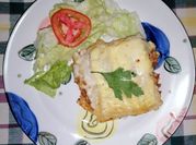 Una foto de tomate frito de frasco