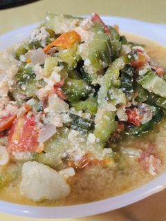 A picture of Savory Sautéed Bitter Gourd with Tomatoes / Ampalaya / Bitter Melon.