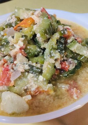 A picture of Savory Sautéed Bitter Gourd with Tomatoes / Ampalaya / Bitter Melon.