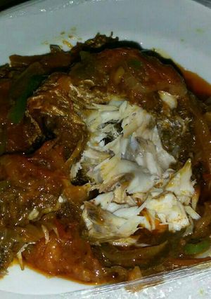 A picture of Croaker fish sauce with spring onions.