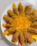 Bò cuộn nấm kim châm sốt chua ngọt