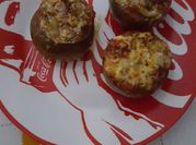 Una foto de tomates rellenos al horno