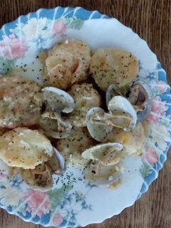Una foto de Patatas presumidas con almejas