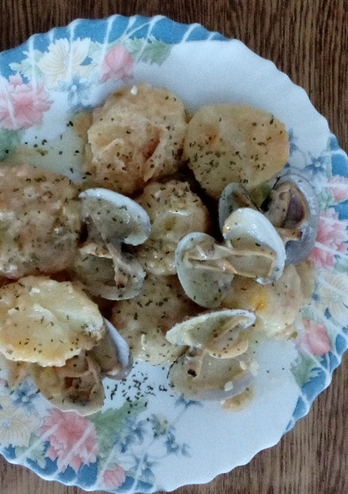 Una foto de Patatas presumidas con almejas