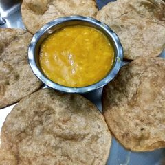 A picture of Aamras and puri.