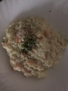 Una foto de Arroz caldoso con crema de gambas 🦐