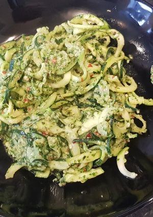 A picture of Courgette spaghetti with pesto without cheese.