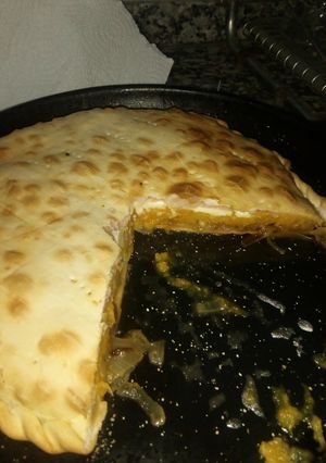 Una foto de Tarta de calabacín y cebolla