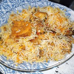 A picture of Tomato Chicken Biryani.