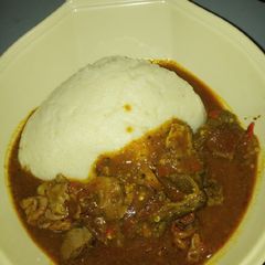 A picture of Semo and dry okro soup.