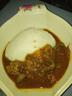 A picture of Semo and dry okro soup.