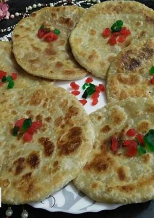 A picture of Moong dal paratha Moong dal ki puran puli Pesarapappu bobbatlu.