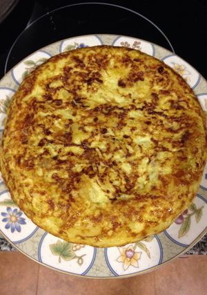 Una foto de Tortilla de patata, cebolla y calabacín