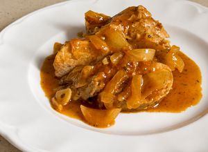 Foto principal de Solomillo de cerdo al horno con salsa de tomate