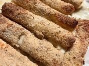 A picture of cheesy mozzarella sticks