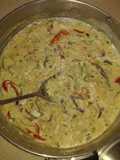 Filete de calamar en salsa bechamel y tostones