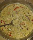 Filete de calamar en salsa bechamel y tostones