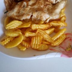Fried chips with egg A picture of Fried chips with egg.