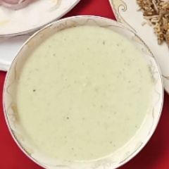 A picture of Garlic Raita (garlic yogurt sauce).