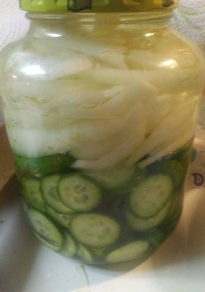 A picture of Refrigerator Pickled Cucumber and onion.