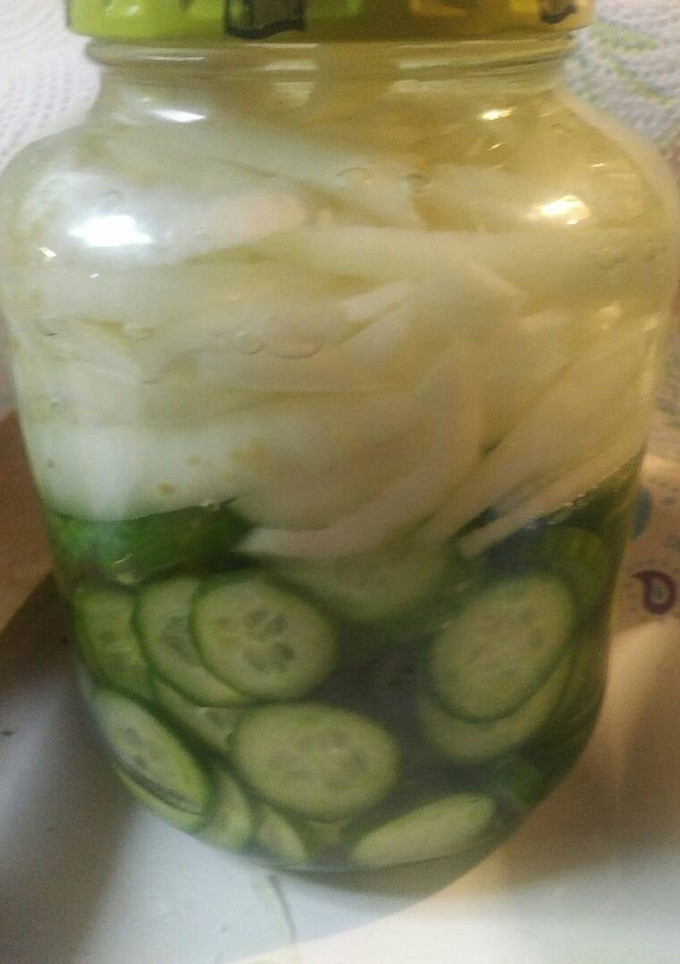 A picture of Refrigerator Pickled Cucumber and onion.