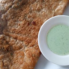 A picture of Cheesy Moli paratha 🤤🤤🤤.