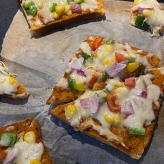 A picture of Open pizza sandwich.