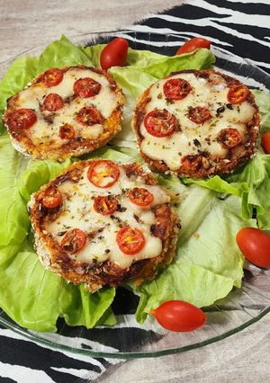 Una foto de 💫Milanesas de calabaza a la napolitana 💫 Horneadas 💫 Salvado de avena y semillas 💫