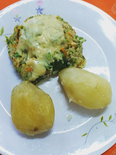 Una foto de Rollito de zapallo italiano y espinaca