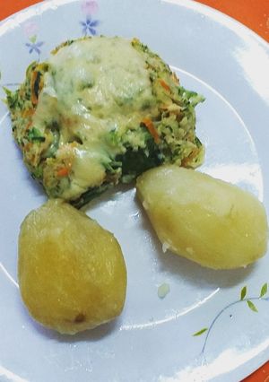 Una foto de Rollito de zapallo italiano y espinaca