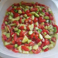 A picture of Cucumber, Tomato, & Onion Salad.